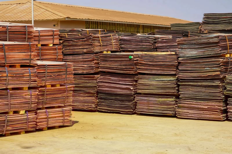 Stacked hardwood boards in a warehouse ready for sale